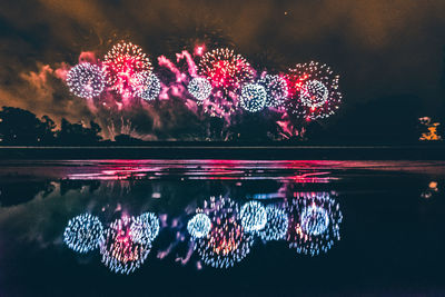 Firework display at night