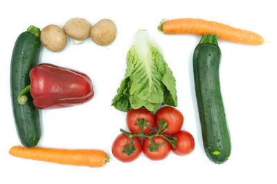 Fruits and vegetables on white background