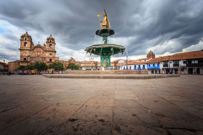 View of historical building against cloudy sky