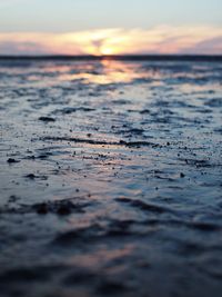 Scenic view of sea at sunset