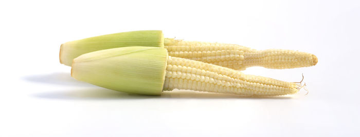 Close-up of banana against white background