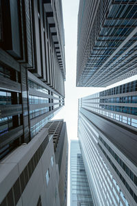 Low angle view of skyscrapers against sky