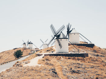 Traditional windmill against clear sky