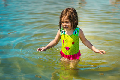 Girl walking in sea