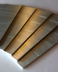 High angle view of piano keys on wooden table
