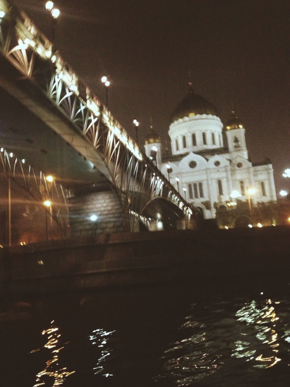 night, illuminated, architecture, built structure, building exterior, reflection, water, lighting equipment, city, waterfront, building, river, light - natural phenomenon, dark, street light, no people, outdoors, residential building, sky, bridge - man made structure