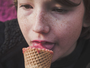 Close-up of man eating ice cream