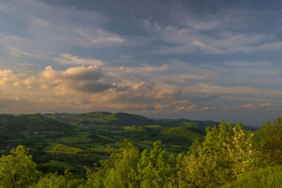 Scenic view of landscape against sky during sunset