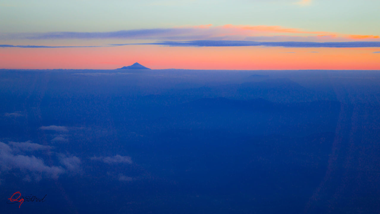 AERIAL VIEW OF LANDSCAPE AGAINST DRAMATIC SKY