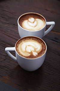 Close-up of cappuccino on table