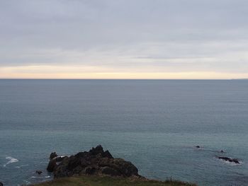 Scenic view of calm sea against sky