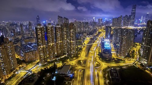 High angle view of illuminated cityscape at night