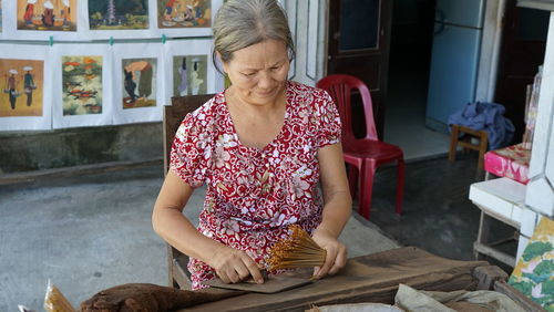 Midsection of woman working