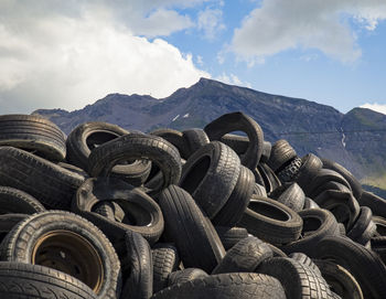 Stack of tires against apls