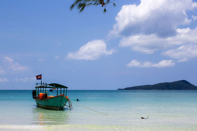 Boat in sea against sky