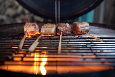 Close-up of meat on barbecue grill