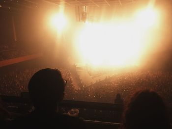 Rear view of people at music concert