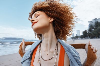 Portrait of smiling young woman