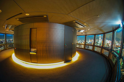 Interior of illuminated railroad station