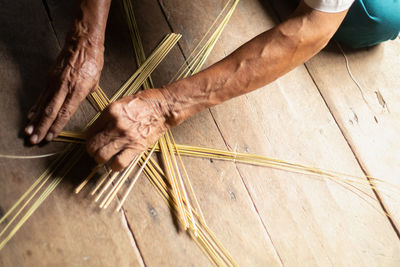 High angle view of man working on wood