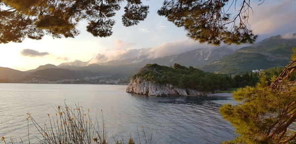 Scenic view of lake against sky during sunset