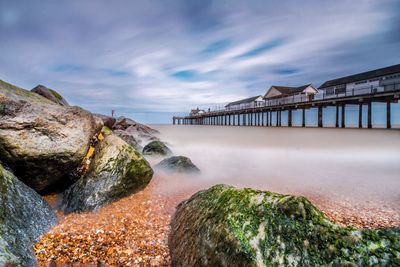 Scenic view of sea against cloudy sky