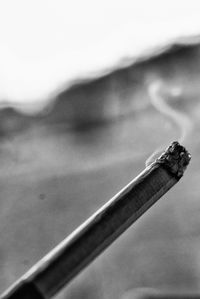 Close-up of smoke stack against sky