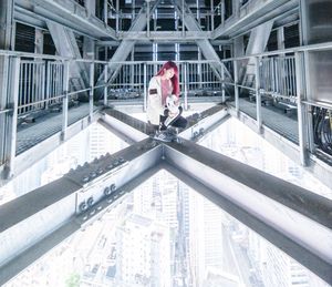 Men walking on bridge