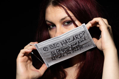 Portrait of woman holding hands