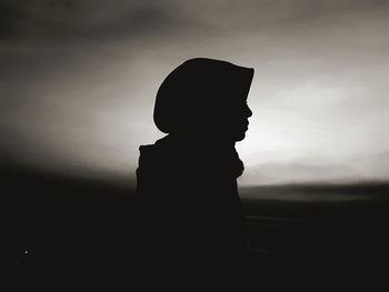 Portrait of silhouette man standing against sky during sunset