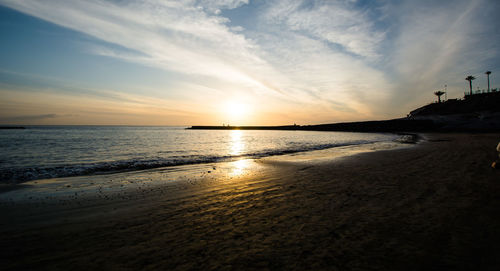 Scenic view of sea against sky during sunset