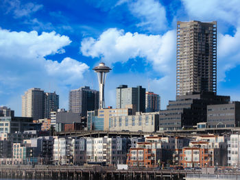 Modern buildings in city against sky