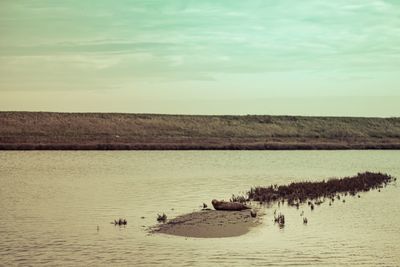 Scenic view of lake against sky