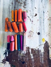 High angle view of colorful crayons on table