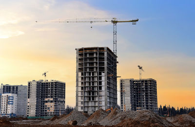 View of buildings against sky during sunset