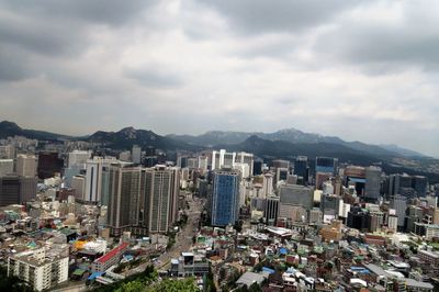 High angle view of buildings against sky in city