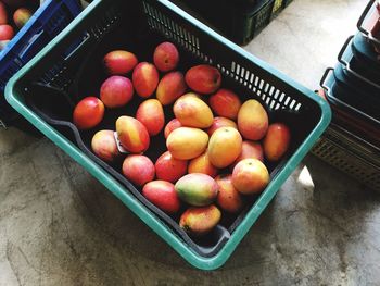 High angle view of fruits in basket at shop for sale