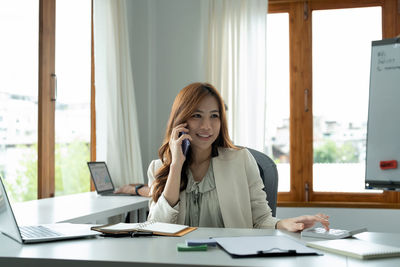 Businesswoman working at office