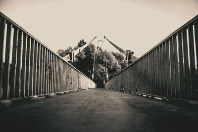 Suspension bridge against sky