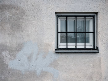 Full frame shot of window on wall of building