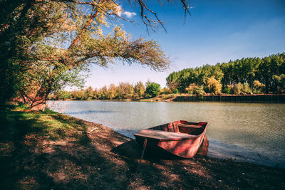 Scenic view of lake against sky during autumn