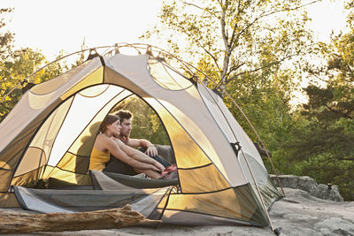 Young couple camping in the forest of fontainebleau close to paris