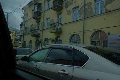 Close-up of car on city street