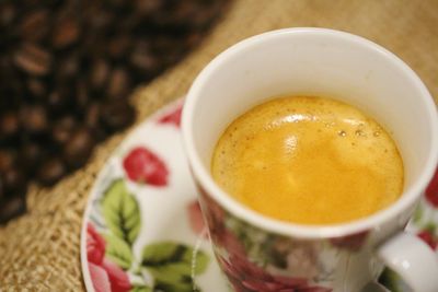 Close-up of coffee cup on table