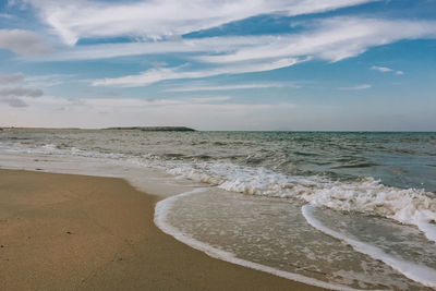 Scenic view of beach against sky