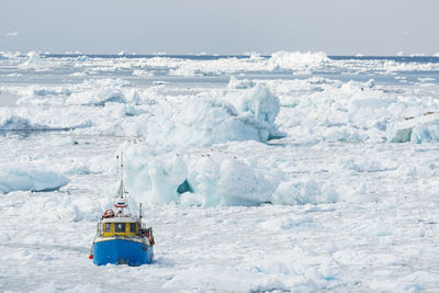 Boat in frozen sea