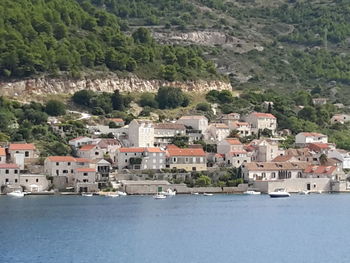 View of town with mountain range in background