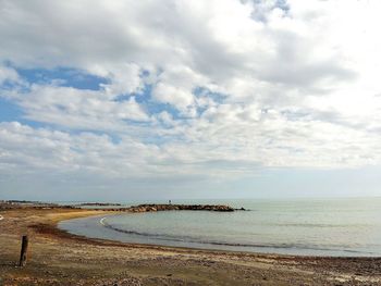 Scenic view of beach against sky