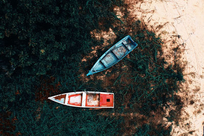 High angle view of abandoned car on land