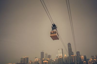 Low angle view of illuminated buildings against clear sky